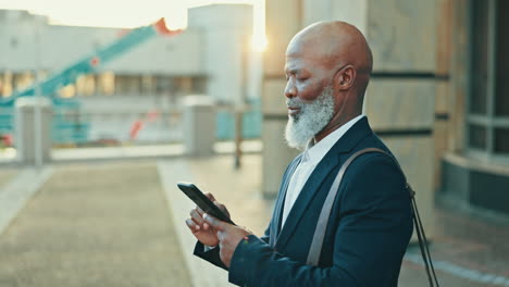 Thinking-senior-business-man-with-a-phone