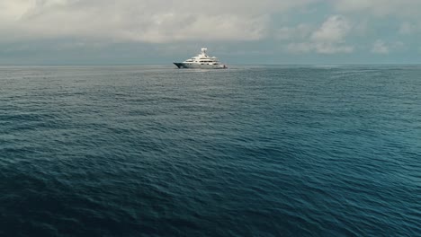 superyacht in frame amongst open ocean