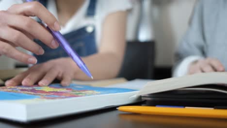 students studying with maps