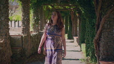 woman walks on a balcony by the river gimbal shot slow motion