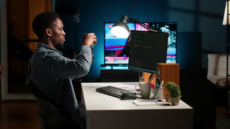 young programmer engineer writing binary code data on terminal window