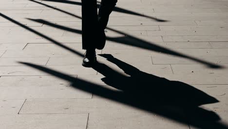 man businessman boss walking near his office center in a dark business suit, experienced ceo entrepreneur in modern office district