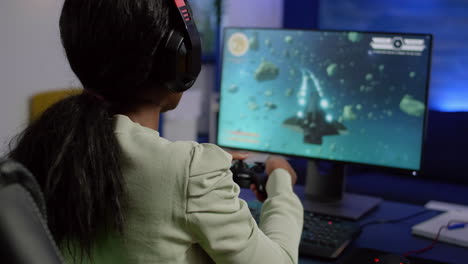 african streamer woman winning space shooter video game