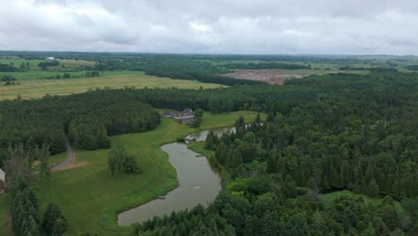 wealthy estate with private trout fishing club in caledon, ontario, aerial establishing dolly