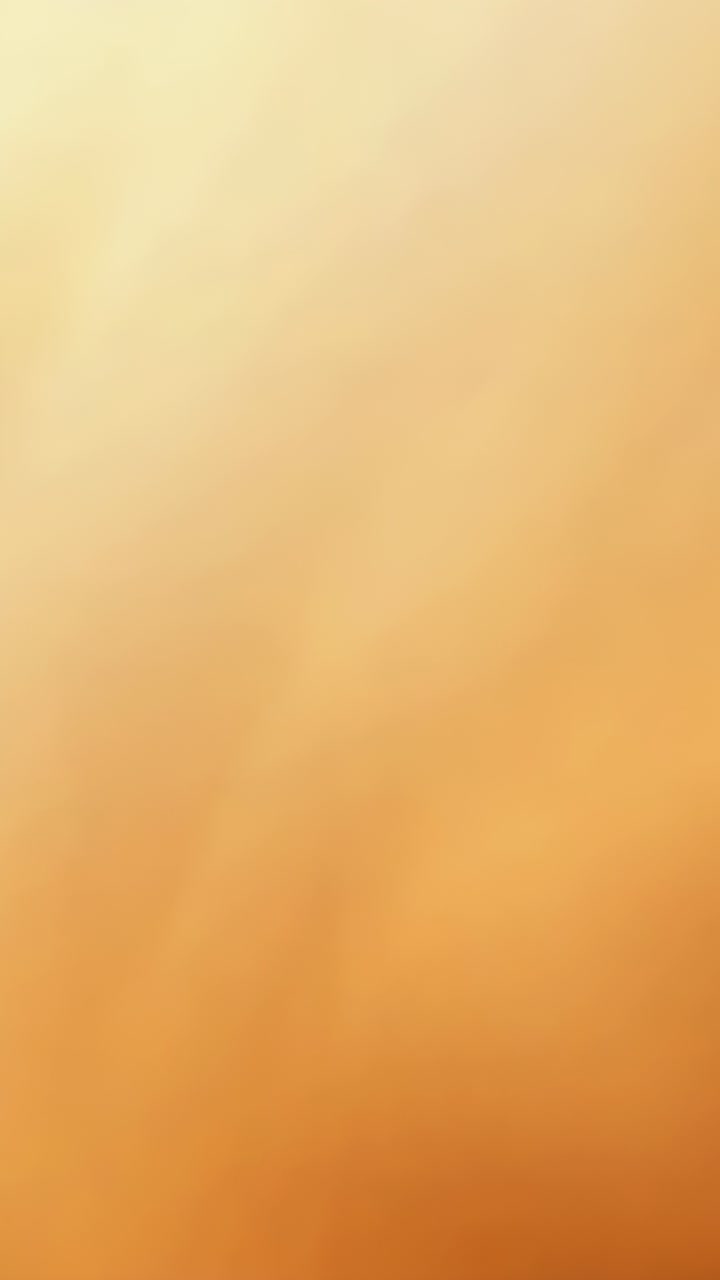 Vertical video: Covering lens, finger creating warm beige blur on camera during handling