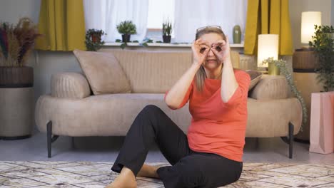 Woman-with-binoculars-looking-away.