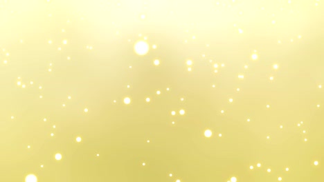 animation of confetti falling with shiny white snowball on gold backdrop. abstract soft background