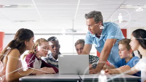 Animation of network of connections with icons over diverse students using laptop in classroom