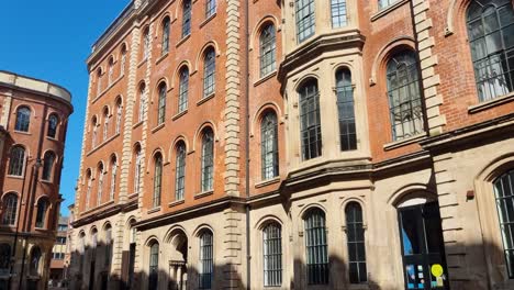 scenic view of historic broadway at nottingham’s lace market, showcasing elegant architecture and heritage charm under a clear blue sky