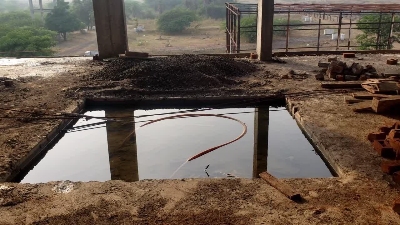 Construction Site with Water Puddle
