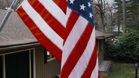 Up-close-look-of-a-flag,-descending-slowly