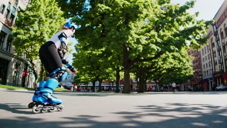 dynamic low-angle shot of a person rollerblading in a park, capturing motion and energy