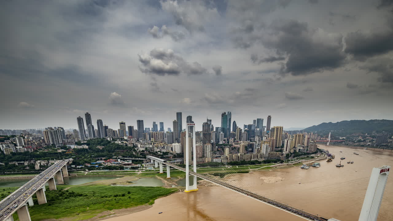 CHONGQING, CHINA - 28 MAY 2025 : Timelapse of the amazing Chongqing cyberpunk city skyline from a high vantage point with the yangtze river