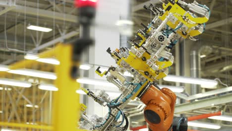 industrial robot arm in a factory