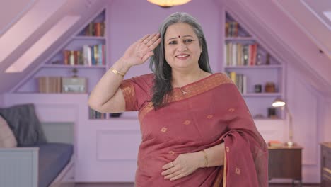 Happy-Indian-old-woman-saluting