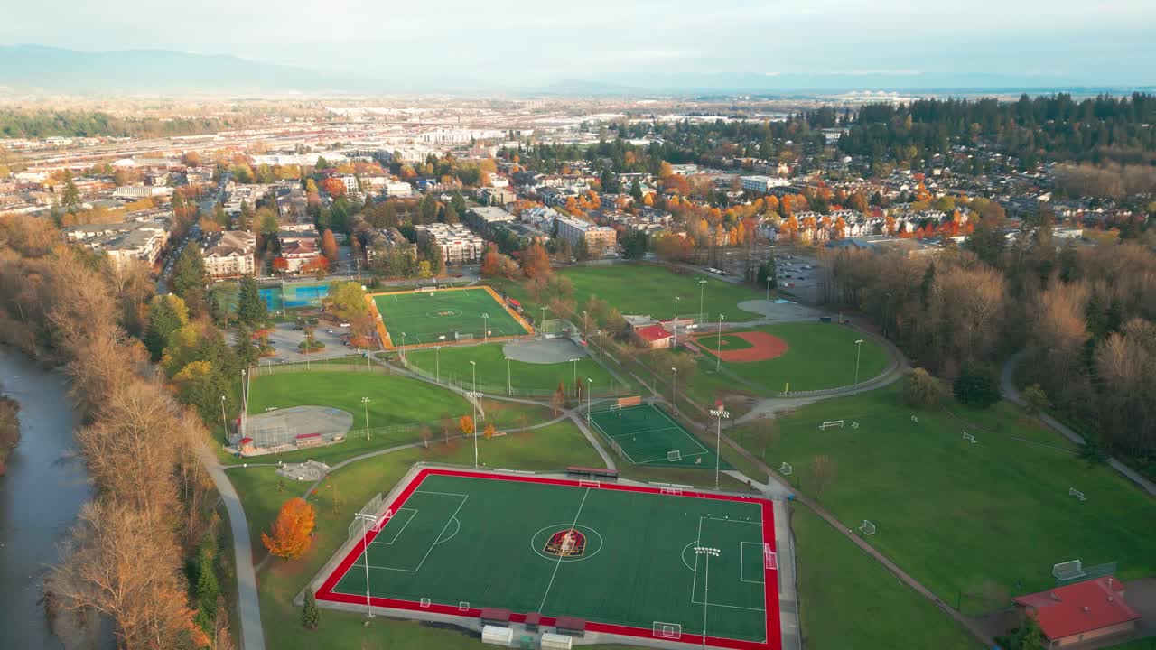 a beautiful daytime autumn shot of gate's park.