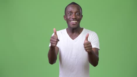 young happy african man giving two thumbs up