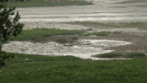 heavy rainfall storm flooding road and sidewalk australia victoria gippsland maffra