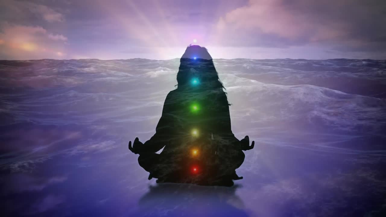 Woman meditating on the ocean