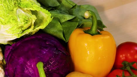 colorful vegetables arranged on a black background