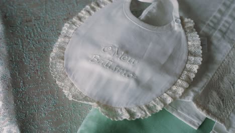 white lace bib with baptism embroidery for baby ceremony tradition