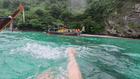 swimming in turquoise waters of a tropical island