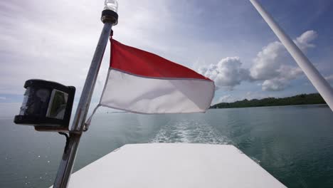 indonesian flag on the boat, kampung bajau, indonesia