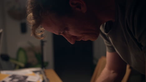 close-up of hands flipping through classified documents on a wooden desk. secret files, red stamps, and confidential papers evoke espionage, investigation, or government conspiracy themes