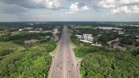 High-aerial-of-vehicle-traffic-on-12-lane-highway