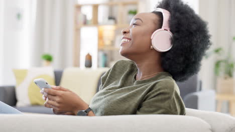 woman dancing while listening to music