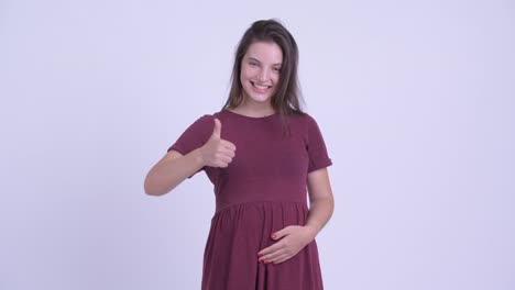 happy young beautiful pregnant woman