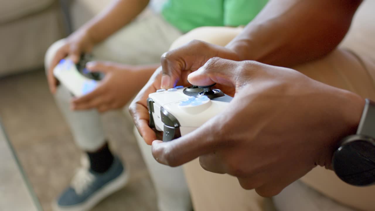 Game starting, front hands are rotating right stick and pressing blue buttons on couch to compete