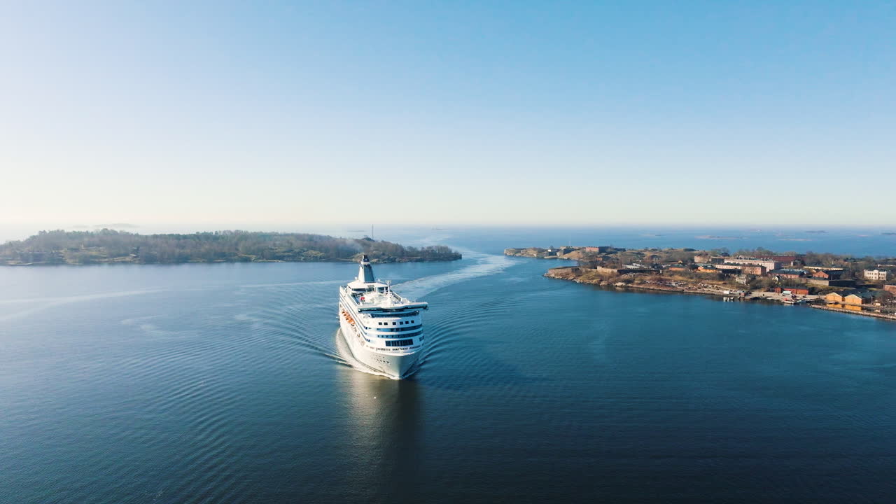Drone descending in front of a shuttle ferry at the Suomenlinna island, Helsinki