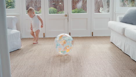 happy-baby-playing-with-ball-at-home-cute-toddler-having-fun-playfully-enjoying-childhood-4k