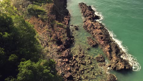 aerial-birds-eye-view-of-rocky-granite-coastline-with-ocean