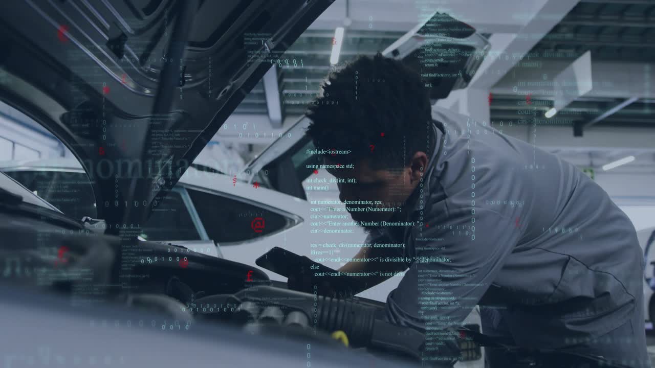 Male tech auto bay leaning into engine, powering tablet, overlaying engine with code and diagnosing