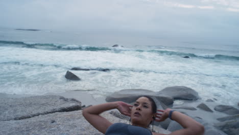 Fitness,-beach-and-woman-sit-up-exercise-in-nature