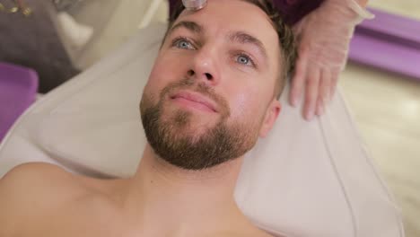 man undergoing facial treatment