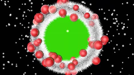 christmas white wreath with christmas toys with a place for a green screen, on a background of falling snow.