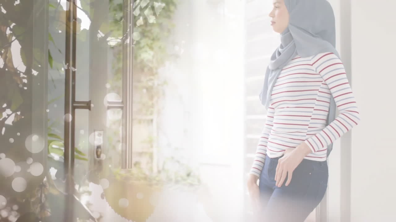 히자브를 입은 두 인종의 여성이 생각하는 잎의 애니메이션