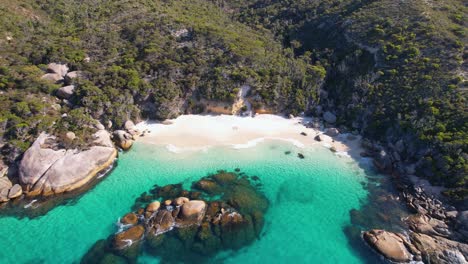 4K-drone-video-of-Waterfall-Beach,-a-small-beach-at-the-end-of-Little-Beach-in-the-Two-Peoples-Bay-Nature-Reserve-in-Nanarup,-Western-Australia