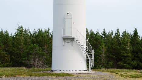 static shot of the maintenance door at the base of a wind turbine