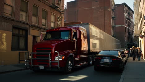 a large red semi-truck with trailer parked on an urban city street