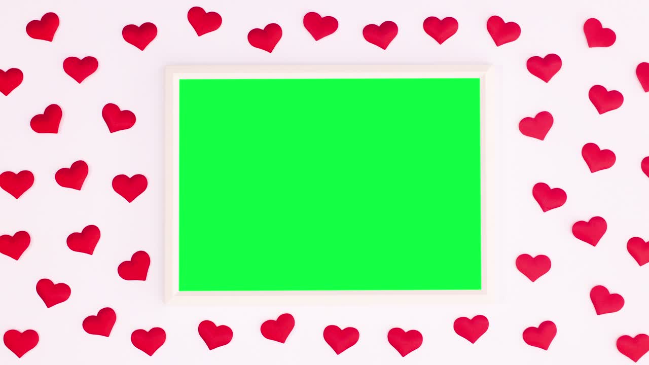 초록색 스크린과 파스텔 분홍색 테마에 빨간 심장을 가진 만적 인 사랑 프레임.