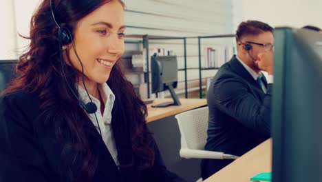 business people wearing headset working in office