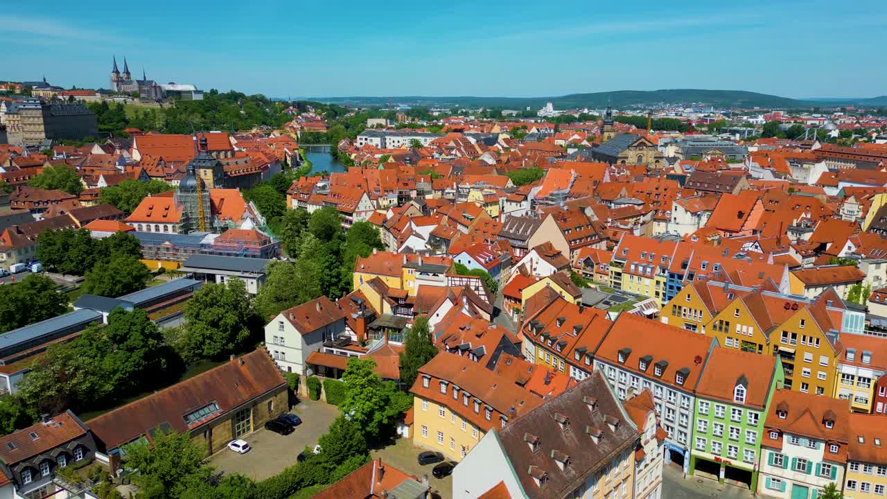4K Aerial Drone Video of the Beautiful Homes and Churches along the Regnitz River in the Old Town area of Downtown Bamberg, Germany