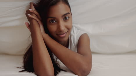Face,-smile-and-an-indian-woman-in-bed