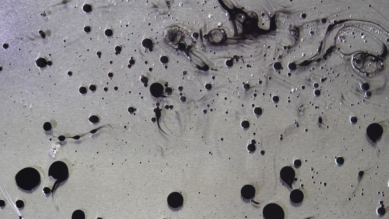 Abstract Ink Blot Art on Metal Surface