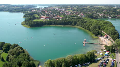 Jezioro-Rekowo-rural-Polish-forest-lake-shore-sightseeing-countryside-reserve-aerial-view-rising-away