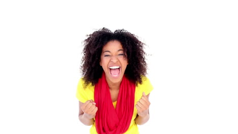 Pretty-girl-in-yellow-tshirt-cheering-at-camera